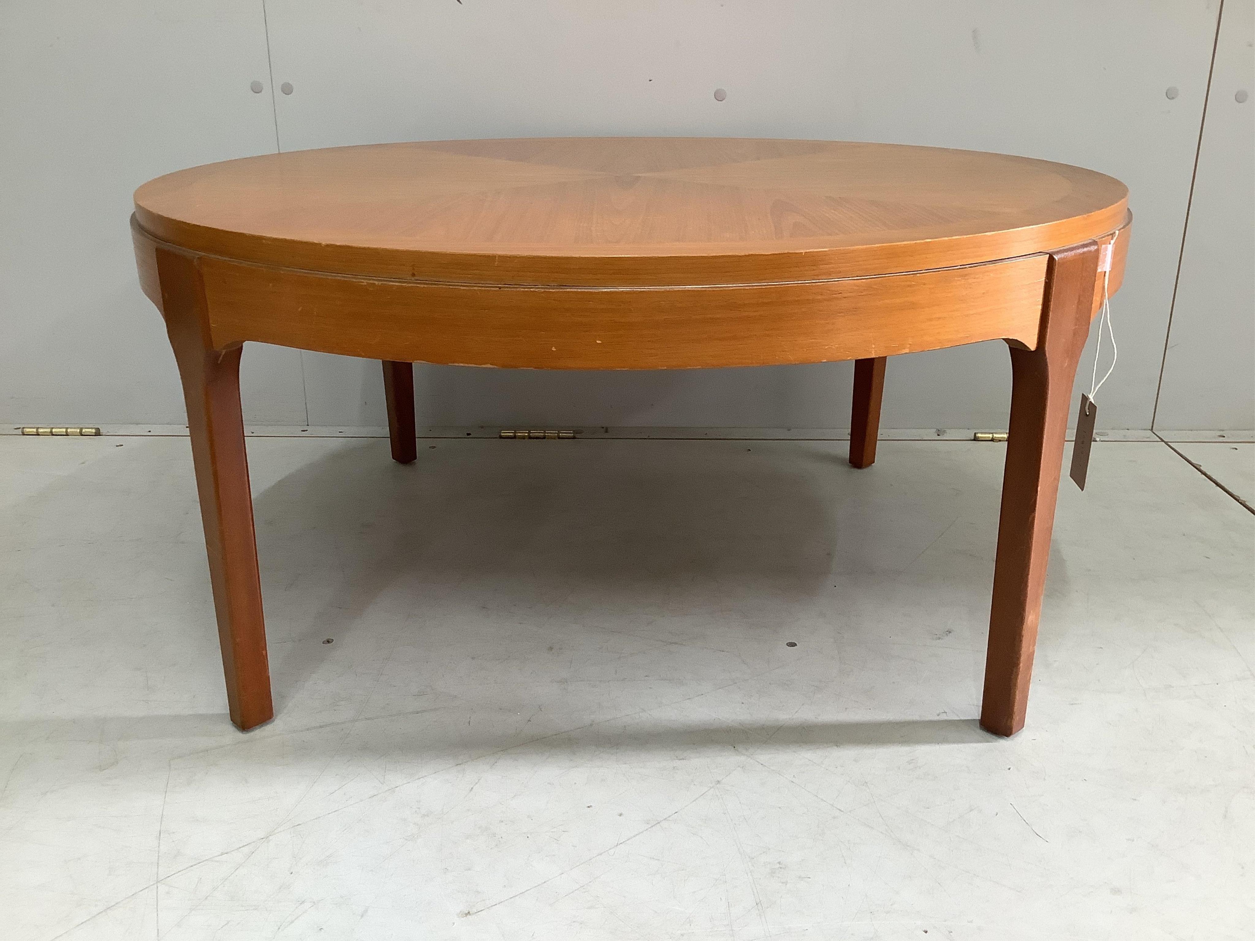 A mid century circular teak coffee table, diameter 87cm, height 41cm